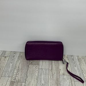 EUC purple leather wallet with wrist strap